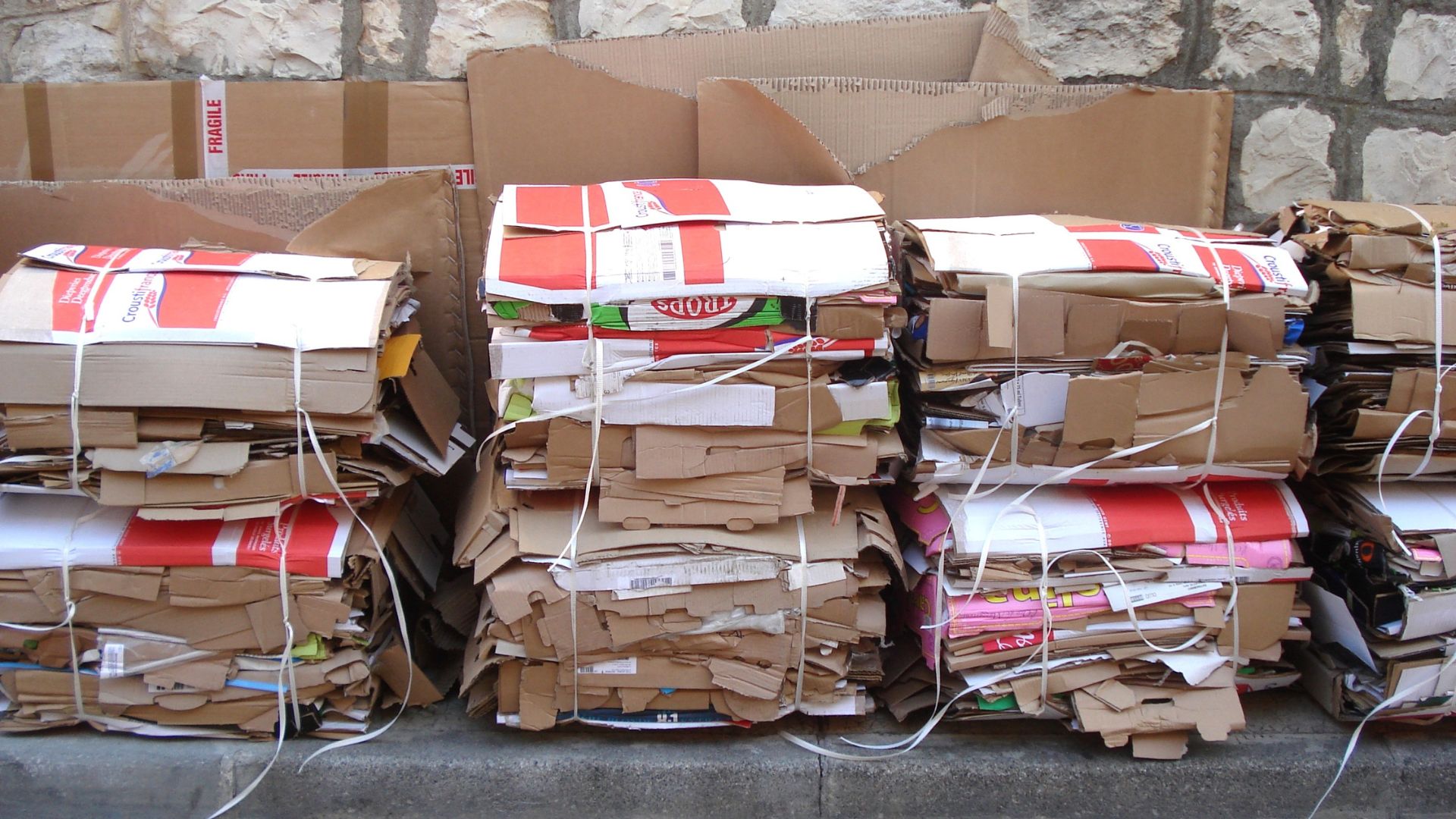 Stacked and bundled cardboard boxes and packaging for recycling